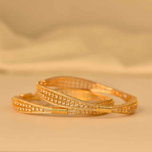 AD Bangle with Gold Polish looks like real Diamond bangle with white stone arranged in beautiful stylish design