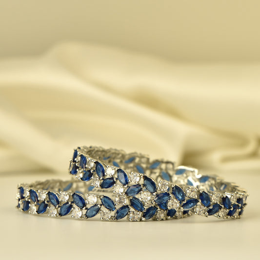 AD Bangle with silver Polish looks like real Diamond stone beautiful arranged in leaf pattern highlighted with dark blue stone