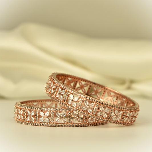 AD Bangle with rose gold polish looks like real Diamond stone with beautiful floral design at center surrounded by white color stone