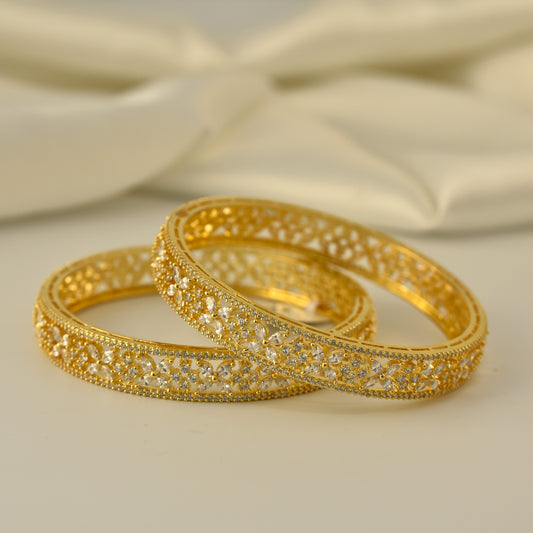 AD Bangle with Gold Polish looks like real Diamond bangle with white stone arranged in beautiful petals stylish design
