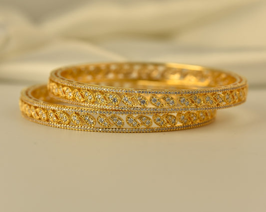 AD Bangle with Gold Polish looks like real Diamond bangle with white stone arranged in beautiful mango motif stylish design